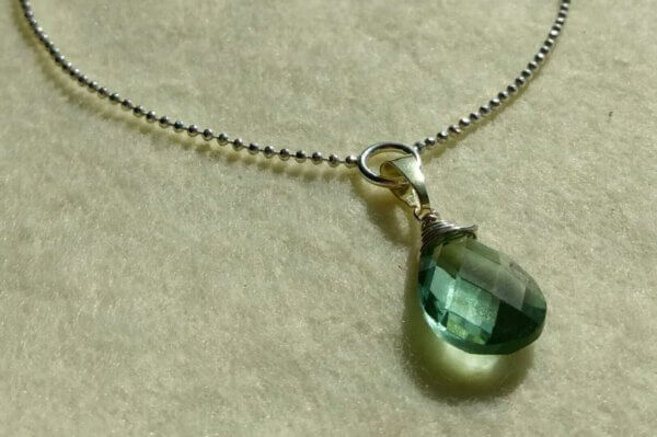 Groene amethist in zilver en goud