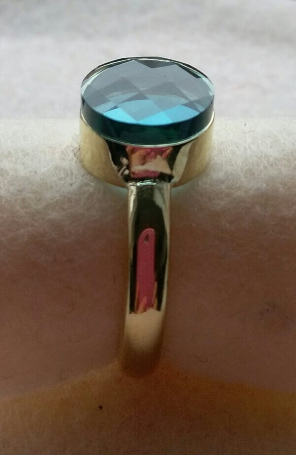 London blue topaas in goud