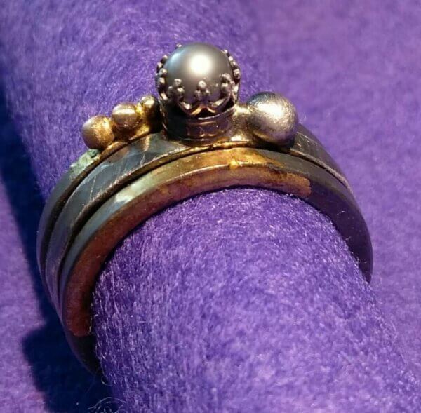 Stapelringen in zilver met gouden accenten
