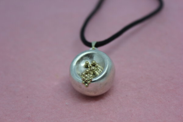 Waterval hanger in zilver en goud