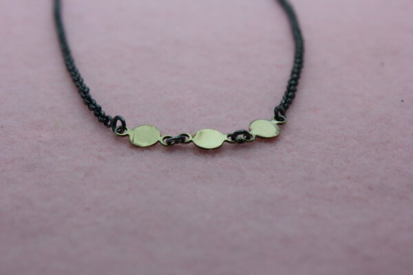 Collier in zwart zilver en goud