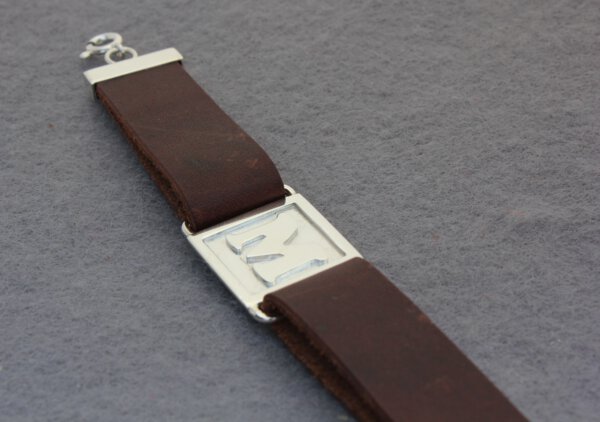Jongensarmband in zilver met leer