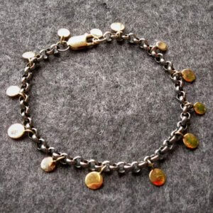 geoxideerde zilveren armband met gouden plaatjes