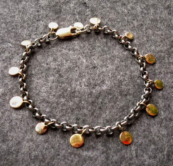 geoxideerde zilveren armband met gouden plaatjes