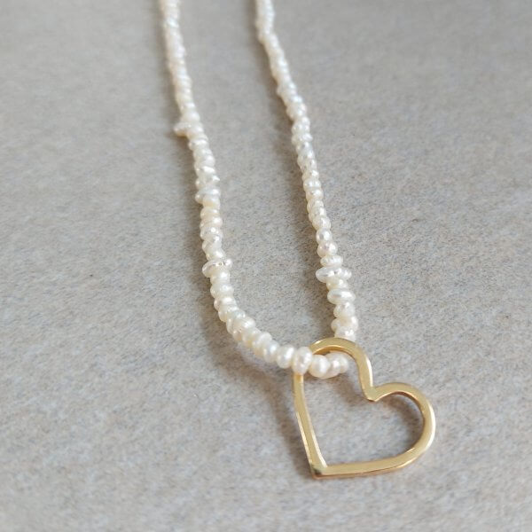 Parelsnoer met gouden hart